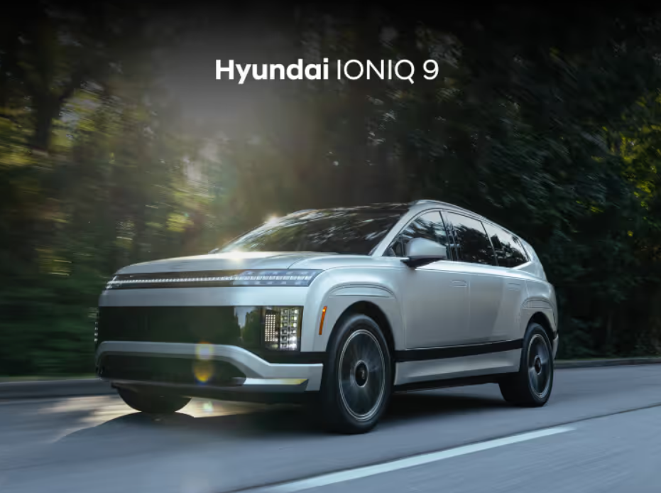 Rear view of a Hyundai SUV driving through the city